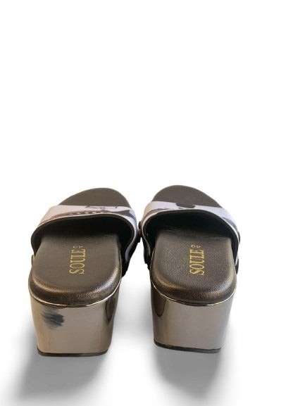 Turn heads + tread softly. The Gun Metal Sole — strong looks, sustainable roots